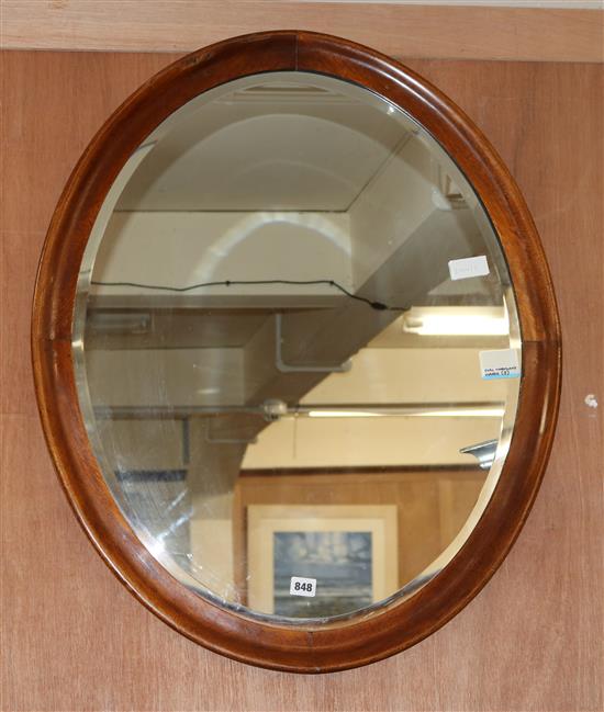 An oval mahogany mirror W.60cm